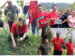 Di Tengah Hujan-Badai, Caroll Senduk & Relawan Tanam Pohon di Tampusu